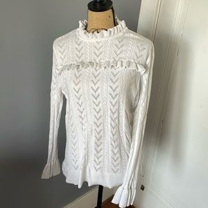 White pointelle sweater